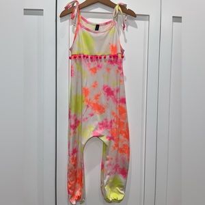Pixie Lane pink, yellow, white, and orange tie cropped jumpsuit with Pom Poms